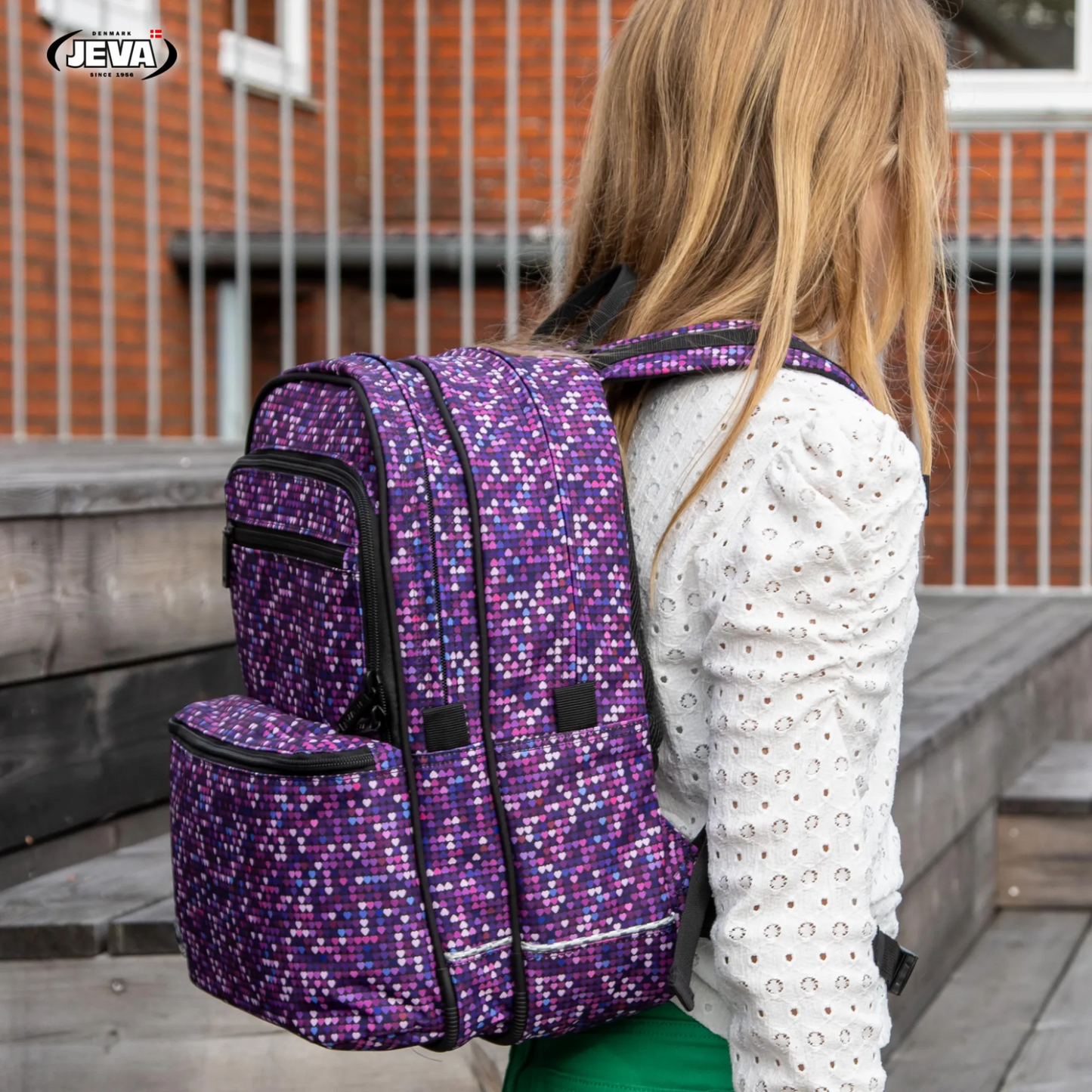 Toffe meisjes rugzak met roze en paarse hartjes print